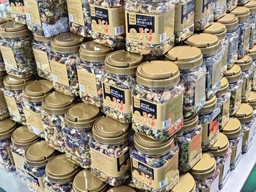 速盈娱乐坚果代工厂5月9号出货小洋楼罐装系列产品
